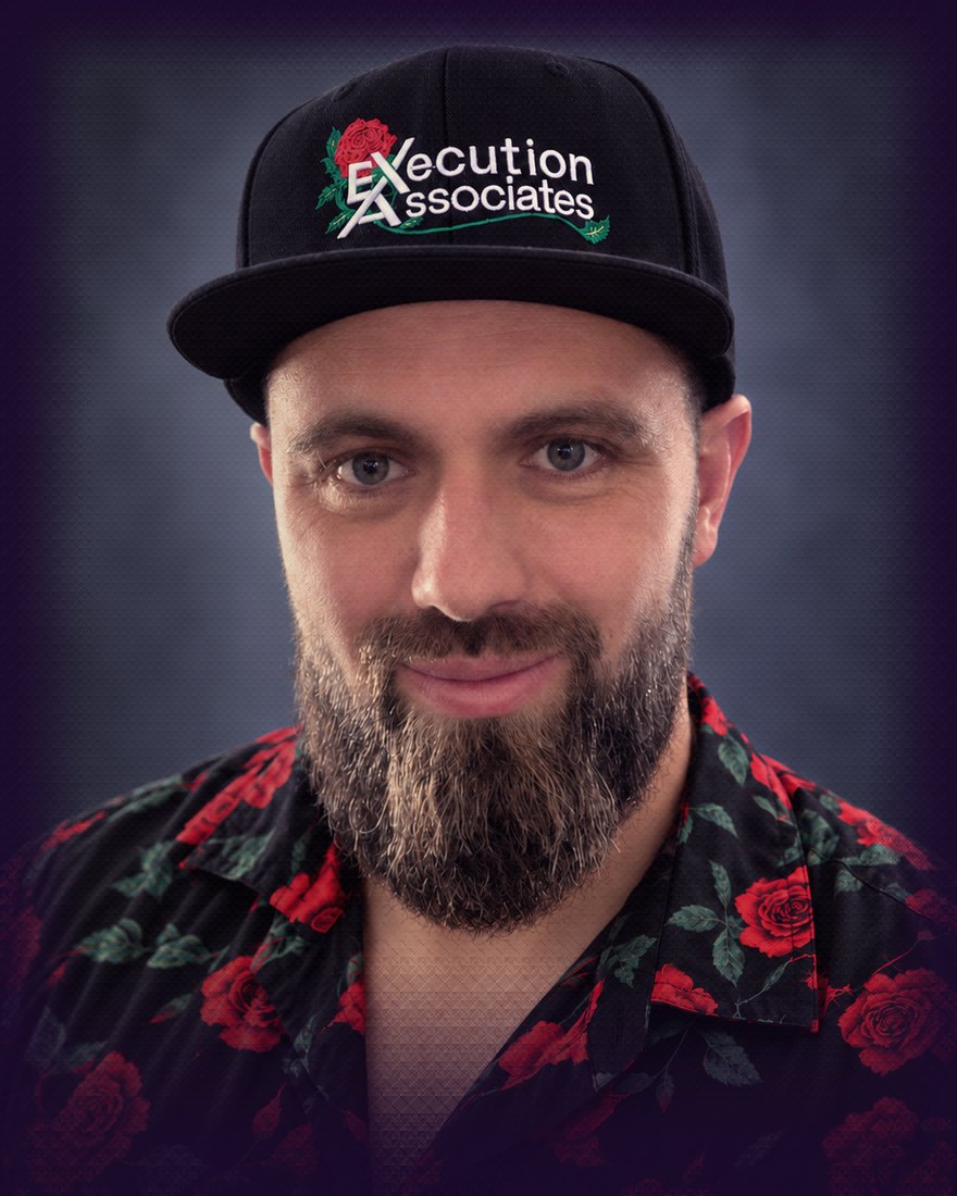 Portrait of D. Saul Jameson in an Execution Associates cap